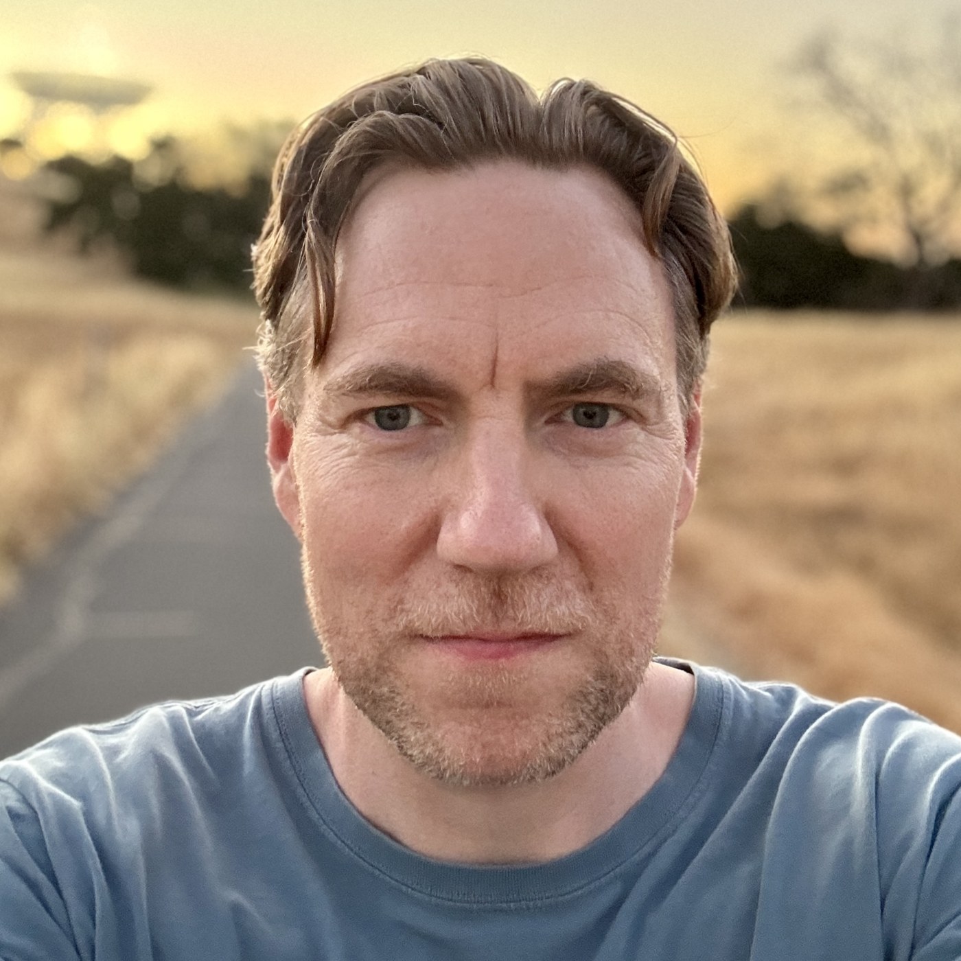 Portrait of Lachlan Donald outdoors at golden hour